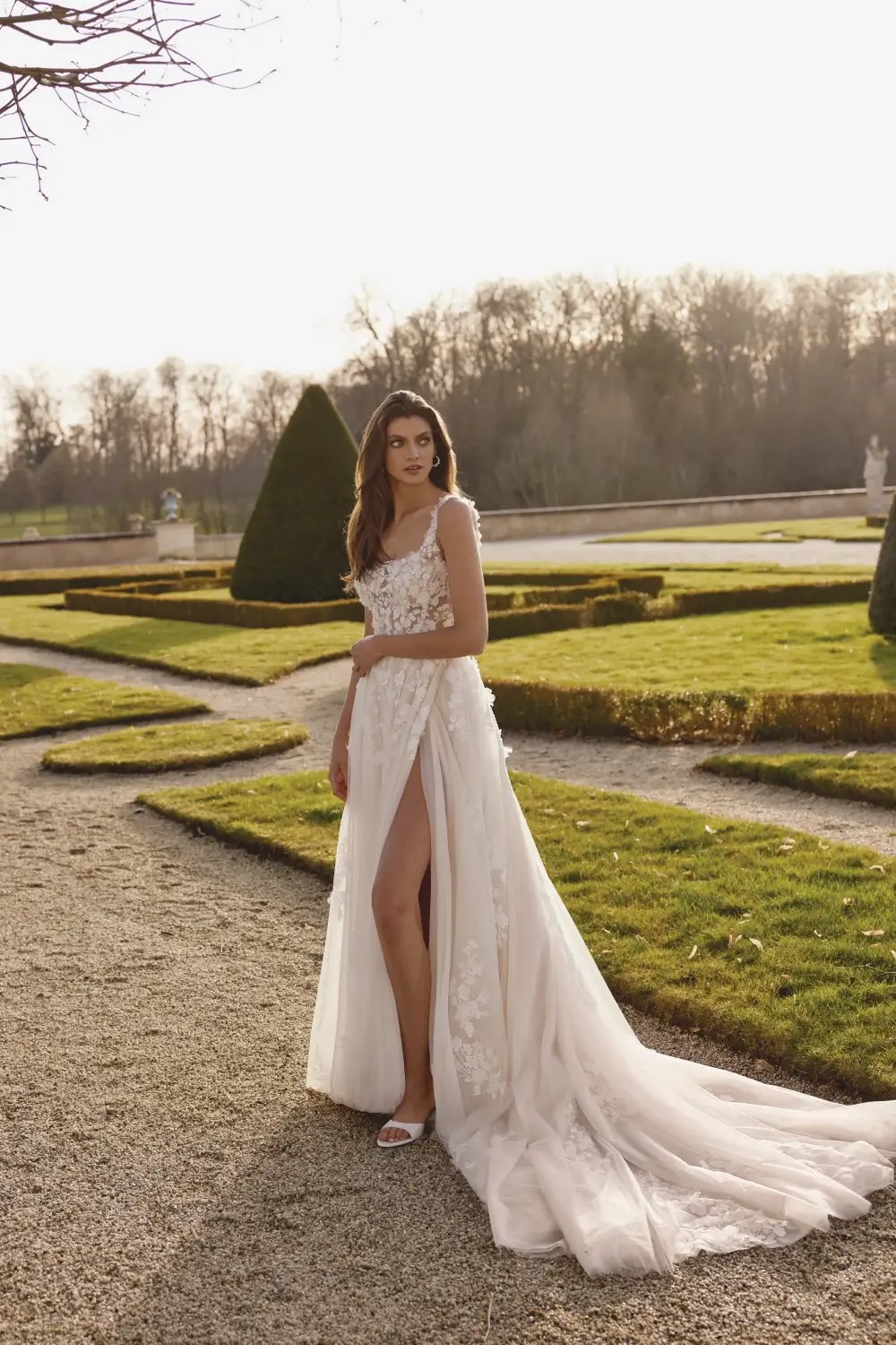 Model wearing a white gown