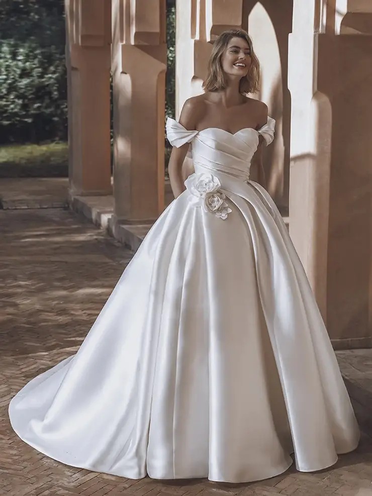 Model wearing Enzoani wedding dress